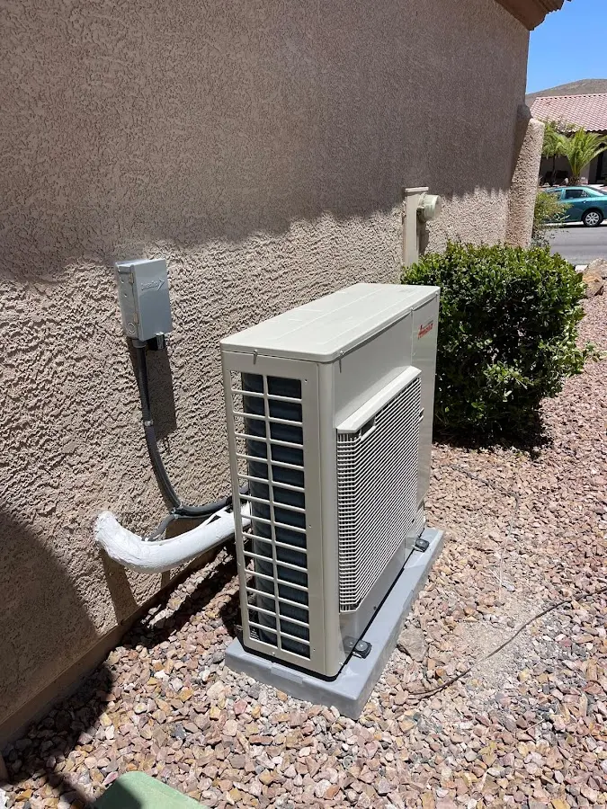 Residential air conditioning condenser unit in Los Banos